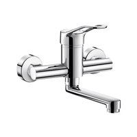 Mechaniczna bateria do umywalki Bateria ścienna z ruchomą wylewką L.150 uchwyt ażurowy Delabie 2446S